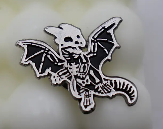 Dragon skeleton pin badge