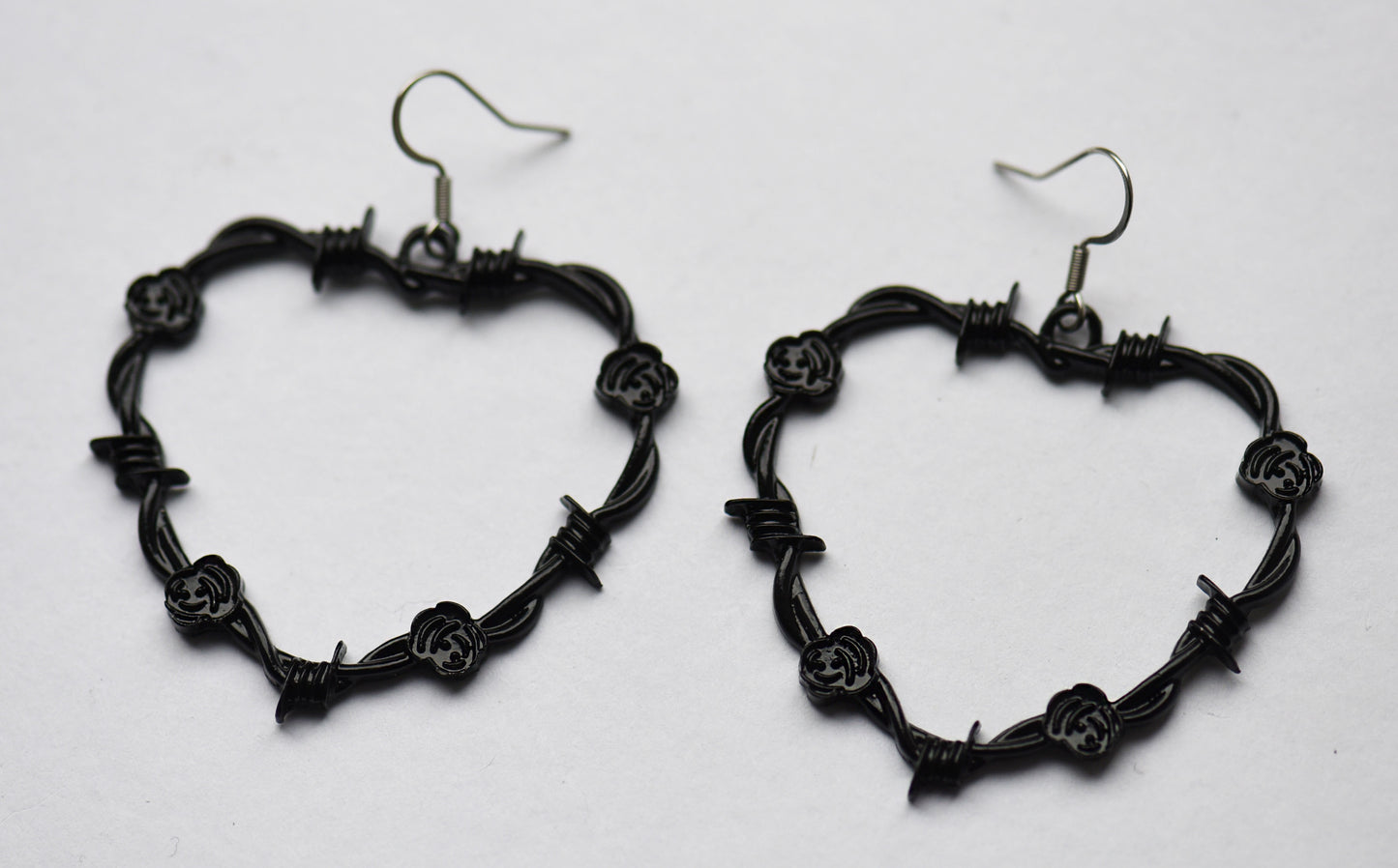 Gothic black heart barbed wire statement earrings on stainless steel ear wires