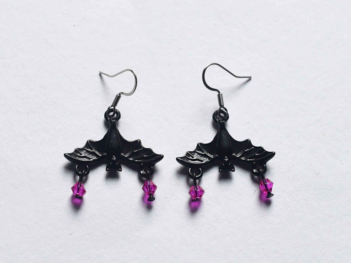 Gothic black bat earrings with hot pink beads and stainless steel ear wires