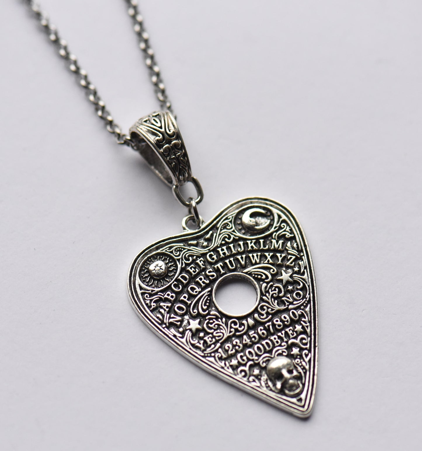 Heart ouija necklace on a 18 inch stainless steel chain