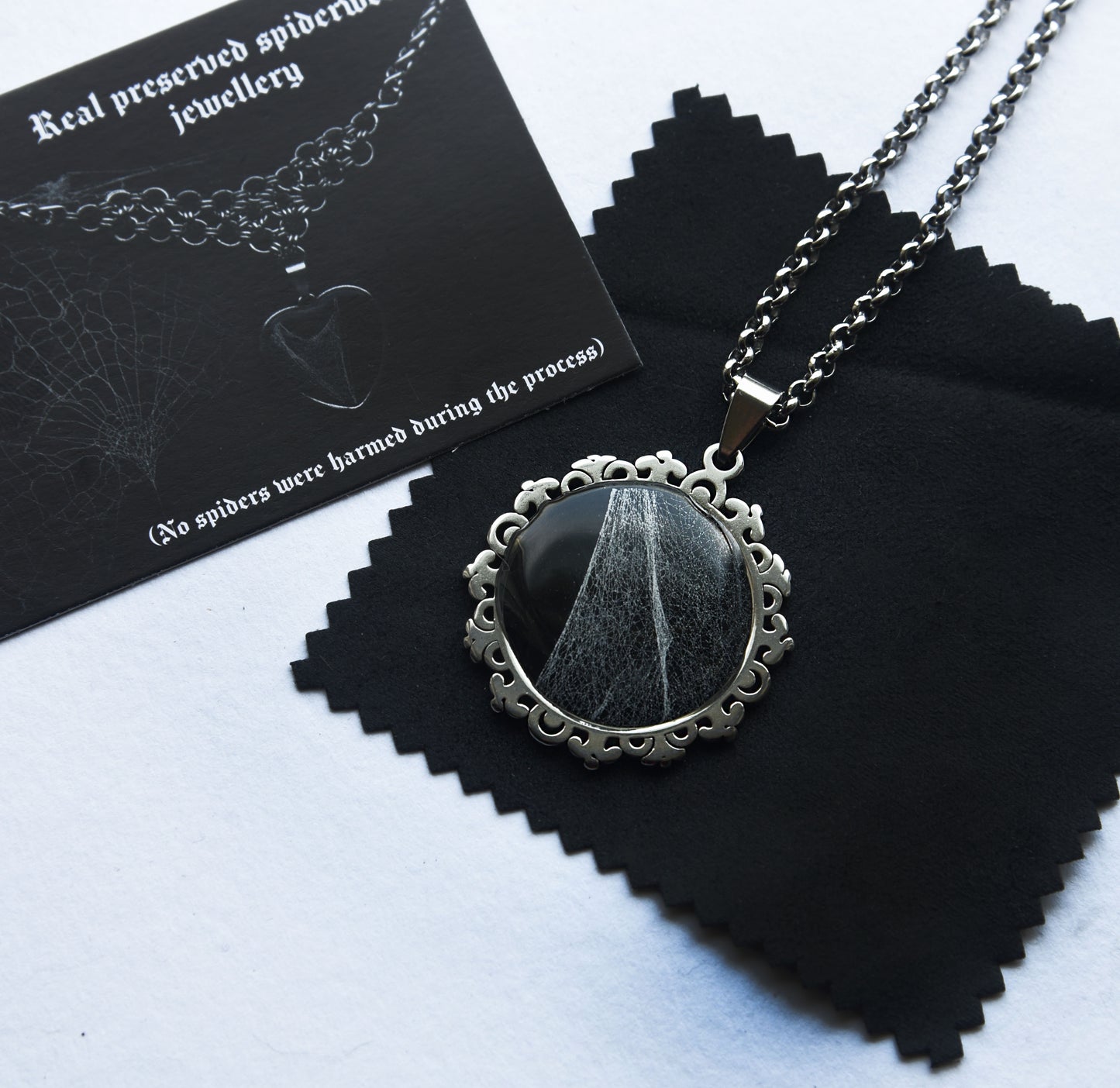 Real preserved spiderweb necklace with a stainless steel chain
