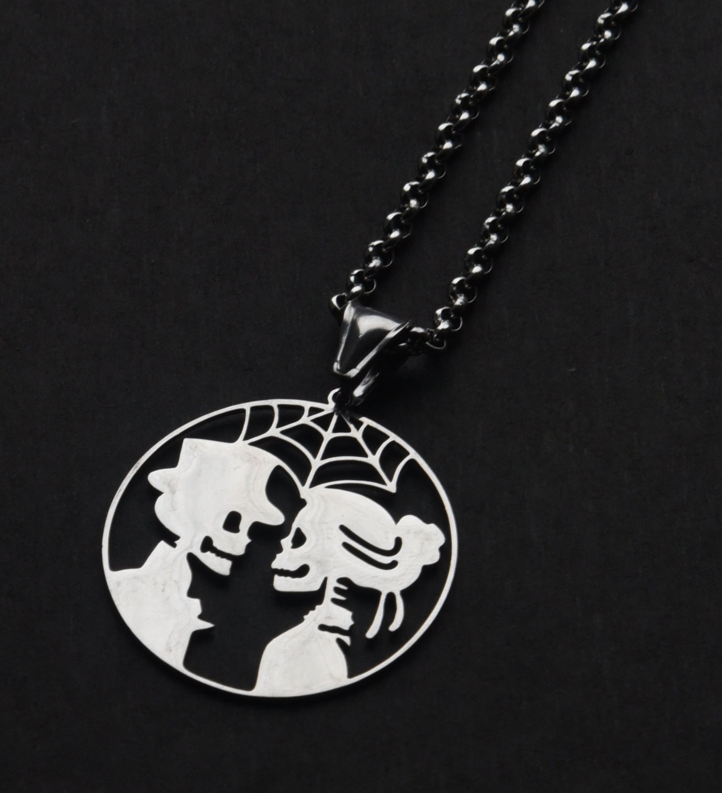 Stainless steel skeleton couple necklace on a 18 inch chain