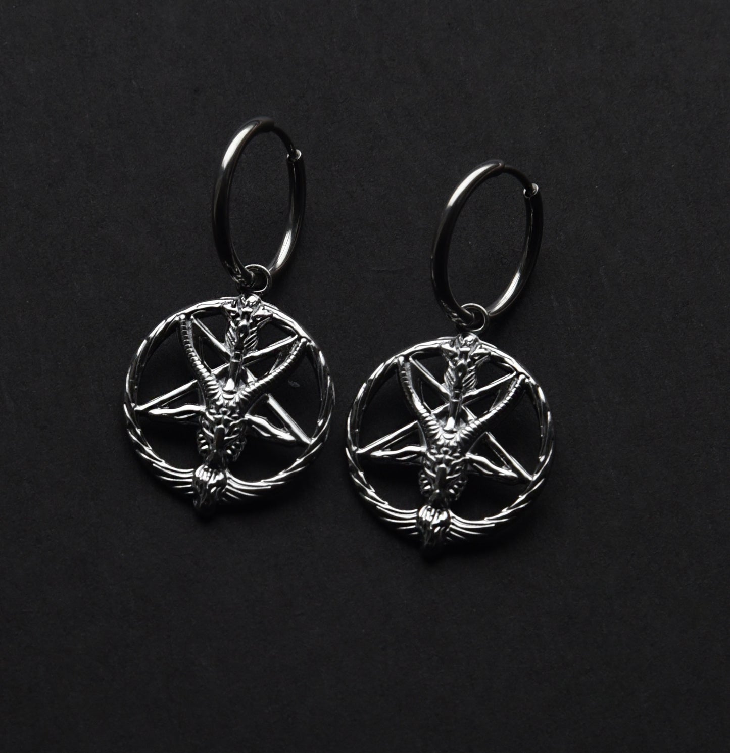 Stainless steel satan pan god skull hoop earrings