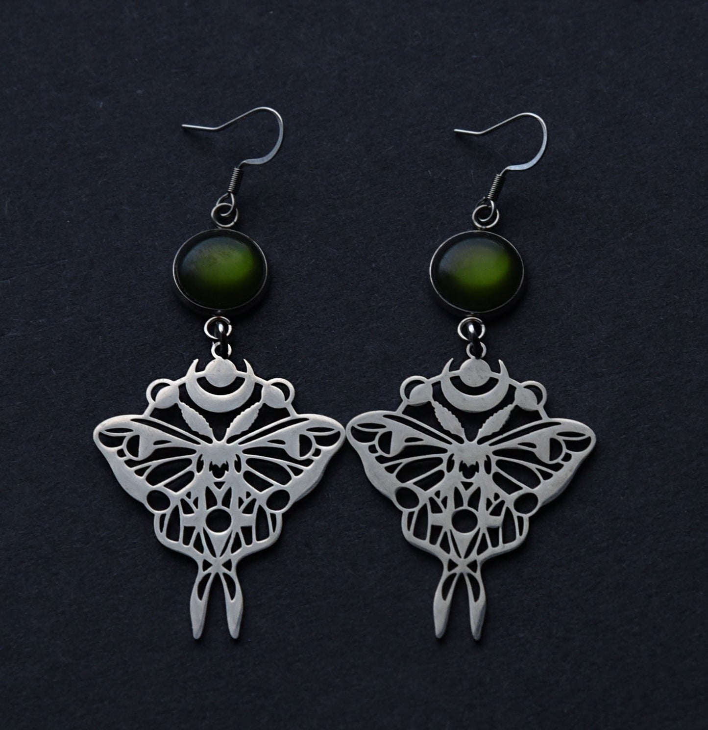 Stainless steel moth earrings with green cabochon charms