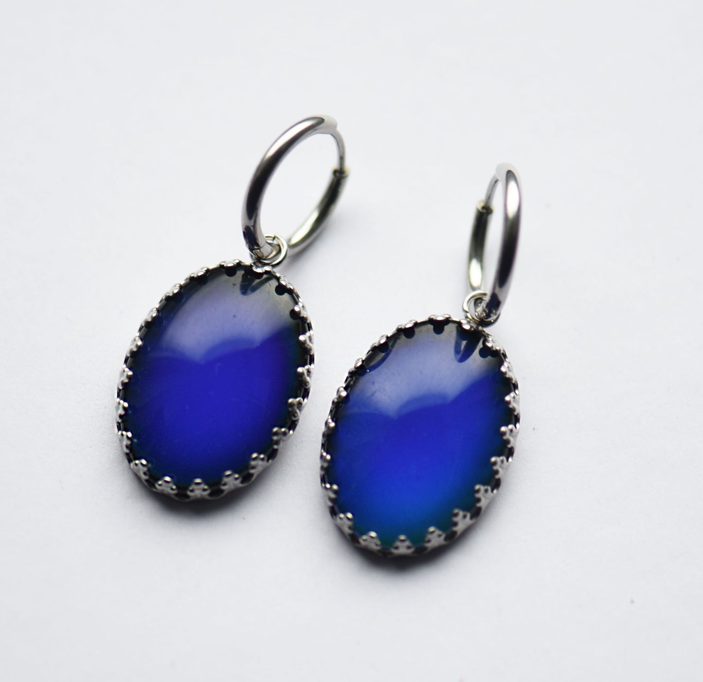 Colour changing cabochon stainless steel earrings