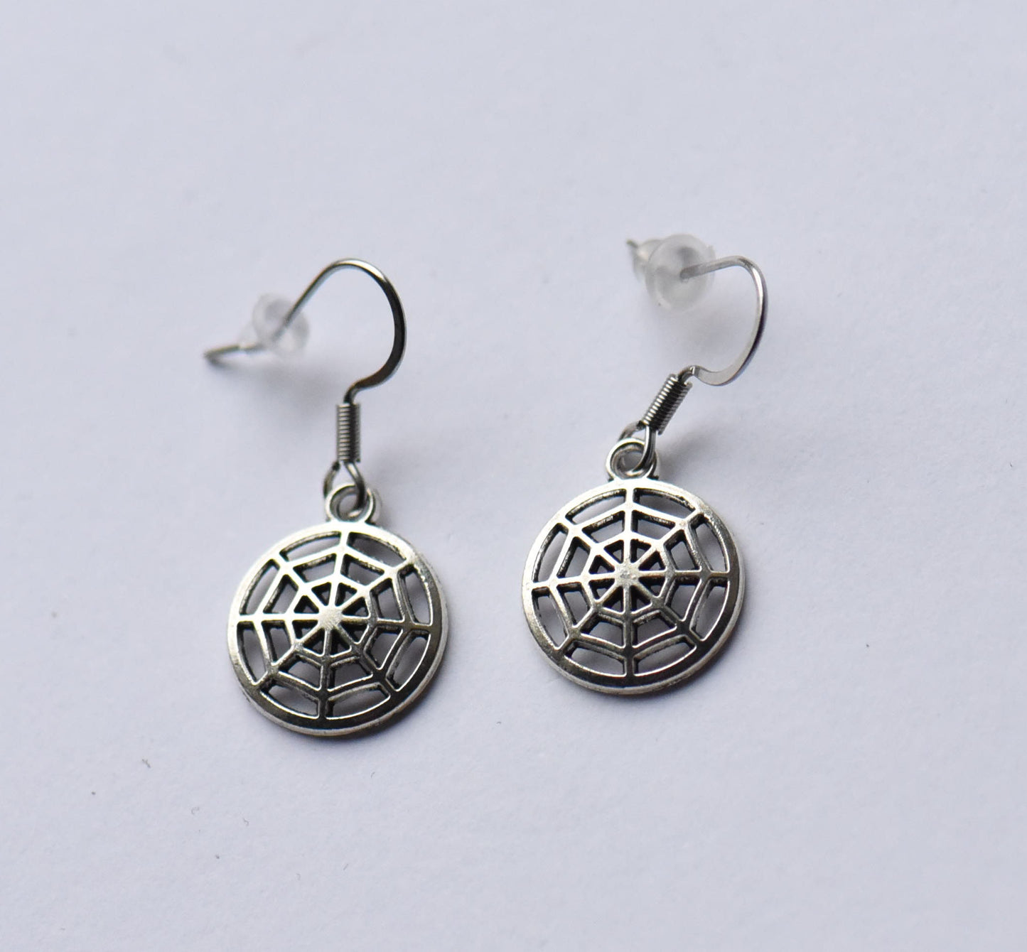 Small spiderweb earrings on stainless steel ear wires