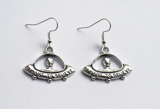 Alien in spaceship earrings with silver tone ear wires