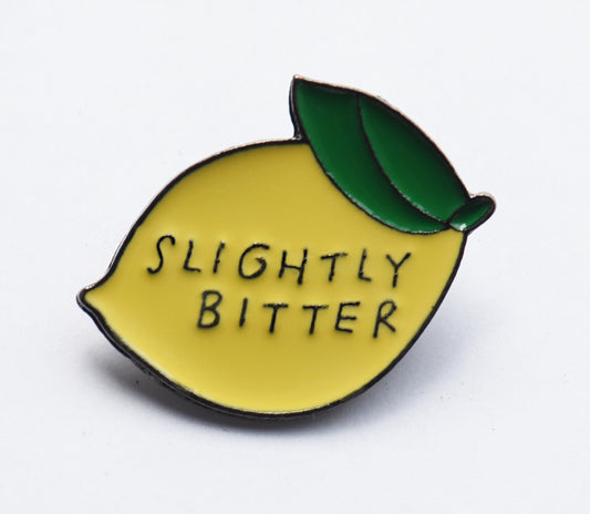 Slightly bitter lemon pin badge