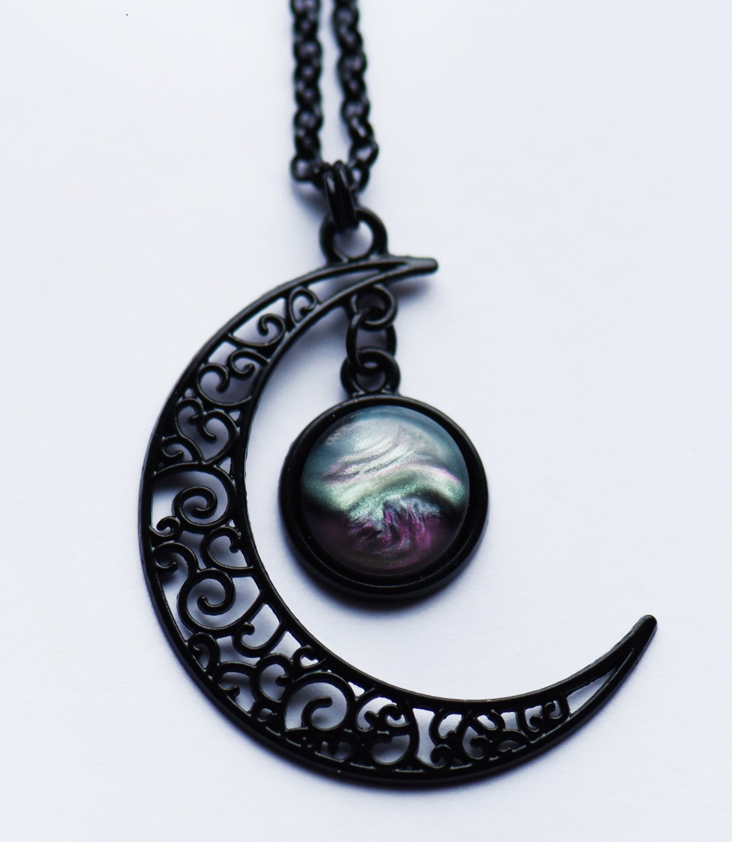 Black resin cabochon and crescent moon necklace